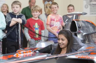 Brooklands Museum Surrey Girl in F1 Simulator Home Educators